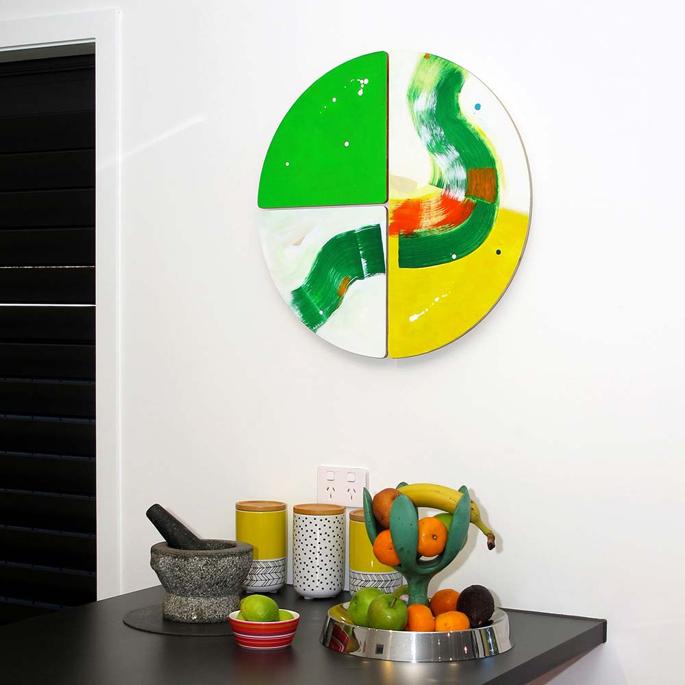 Round original painting Crocodile Belly Skid hanging in a modern kitchen