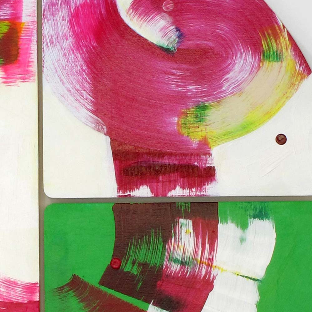 Detail of brushstrokes in magenta, against white &amp; green background