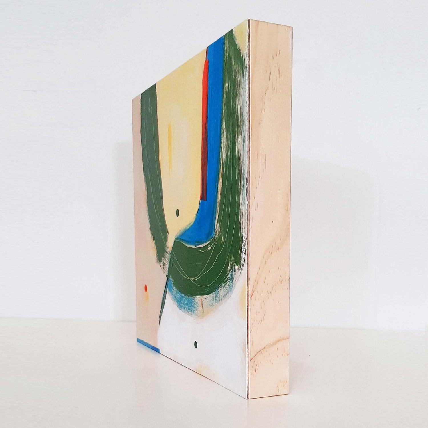 Abstract painting on a ply box board, varnished edges