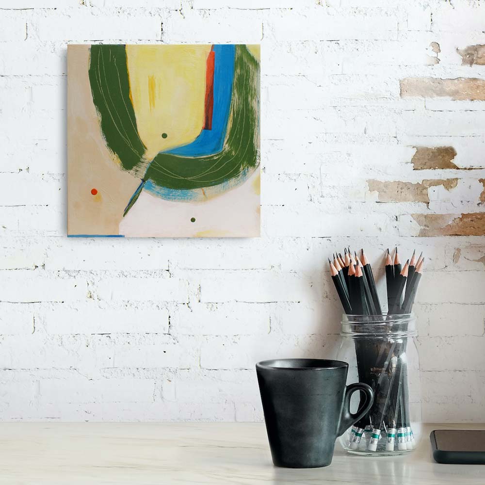 View of small abstract painting for sale on a wall